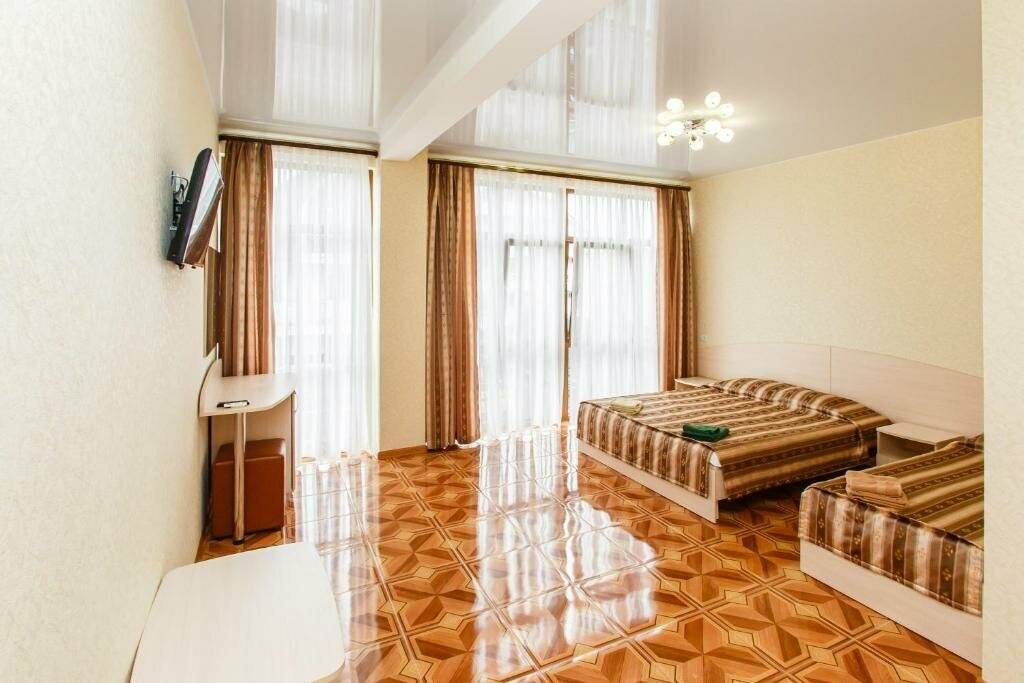 Роскошный трехместный номер